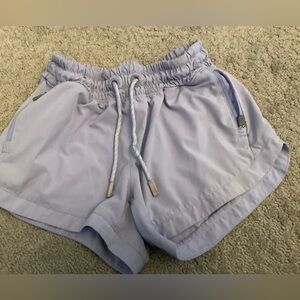 Athleta Girl Purple shorts size 7